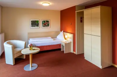 Ein Bett oder Betten in einem Zimmer der Unterkunft Hofgut Algertshausen