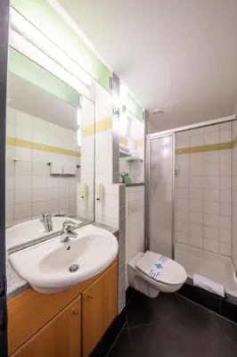 Ein Badezimmer in der Unterkunft Hofgut Algertshausen