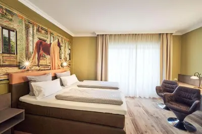 Ein Sitzbereich in der Unterkunft Hotel Starnberger See