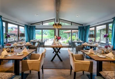 Ein Restaurant oder anderes Speiselokal in der Unterkunft Boutique Hotel Relais Chalet Wilhelmy