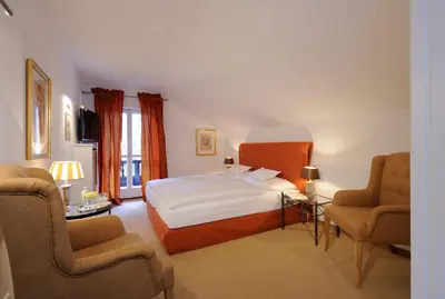 Ein Bett oder Betten in einem Zimmer der Unterkunft Boutique Hotel Relais Chalet Wilhelmy