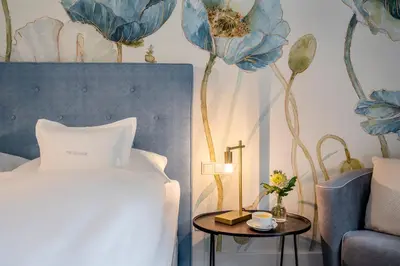Ein Bett oder Betten in einem Zimmer der Unterkunft Boutique Hotel Relais Chalet Wilhelmy