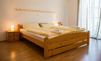Ein Bett oder Betten in einem Zimmer der Unterkunft Alter Wirt Thalkirchen