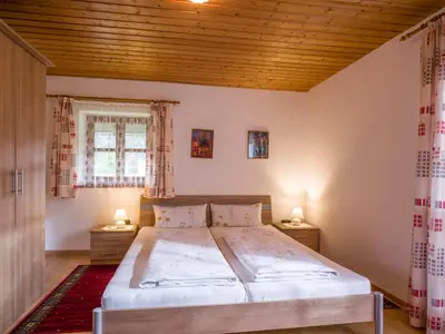 Ein Bett oder Betten in einem Zimmer der Unterkunft Ferienwohnung Danner