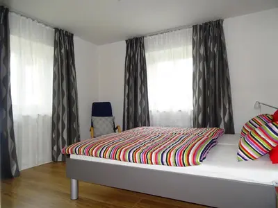 Ein Bett oder Betten in einem Zimmer der Unterkunft Ferienwohnung Litterscheid