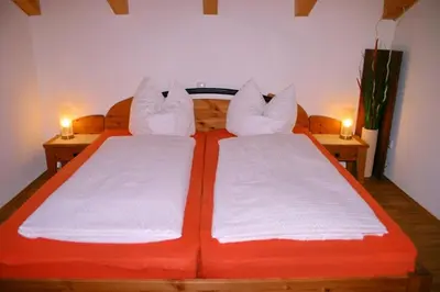 Ein Bett oder Betten in einem Zimmer der Unterkunft Ferienwohnung Schmid Ursula