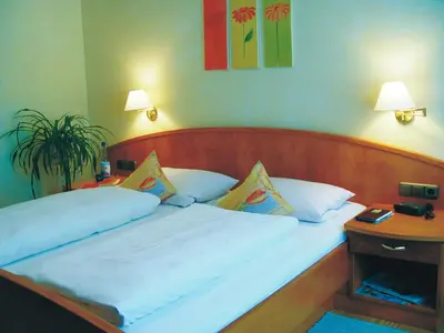 Ein Bett oder Betten in einem Zimmer der Unterkunft Hotel Cebulj