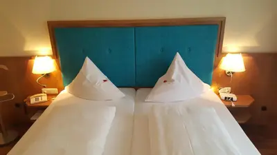 Ein Bett oder Betten in einem Zimmer der Unterkunft Hotel Cebulj