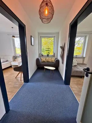 Ein Bett oder Betten in einem Zimmer der Unterkunft Bahnhof City Loft & Apartments