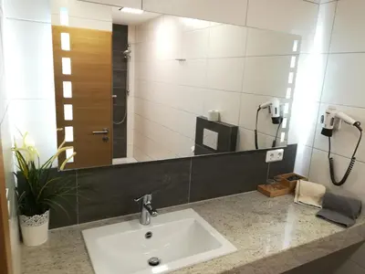 Ein Badezimmer in der Unterkunft Gasthof Bogenrieder