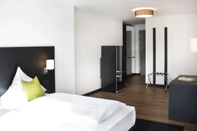 Ein Bett oder Betten in einem Zimmer der Unterkunft ING Hotel by WMM Hotels