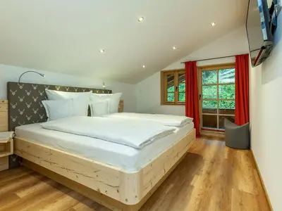 Ein Bett oder Betten in einem Zimmer der Unterkunft Ferienwohnung Staffen
