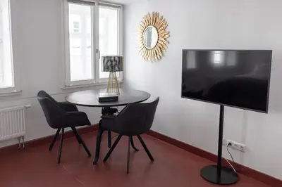 TV/Unterhaltungsangebot in der Unterkunft ANA Suites Augsburg City Center - Self-Service-Hotel