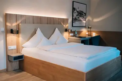 Ein Bett oder Betten in einem Zimmer der Unterkunft Klostermaier Hotel & Restaurant