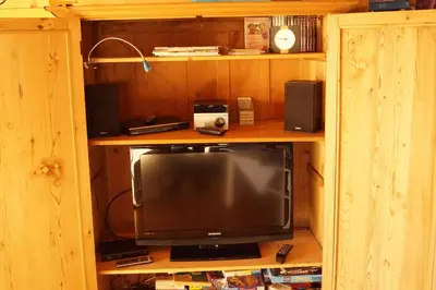 TV/Unterhaltungsangebot in der Unterkunft Ferienwohnung im gemütlichen Blockhaus vor den Bergen