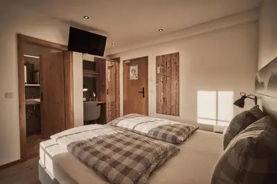 Ein Bett oder Betten in einem Zimmer der Unterkunft Rait´ner Wirt