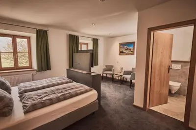 Ein Bett oder Betten in einem Zimmer der Unterkunft Rait´ner Wirt