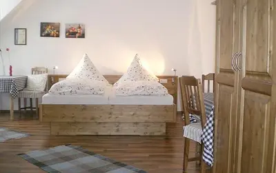 Ein Bett oder Betten in einem Zimmer der Unterkunft Pension Barbara