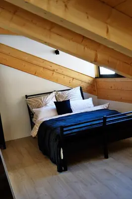 Ein Bett oder Betten in einem Zimmer der Unterkunft Gästehaus am Riedweg