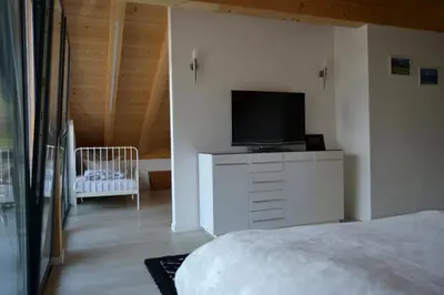 Ein Bett oder Betten in einem Zimmer der Unterkunft Gästehaus am Riedweg