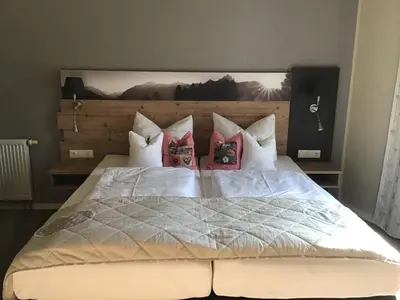Ein Bett oder Betten in einem Zimmer der Unterkunft Ehringer Hof