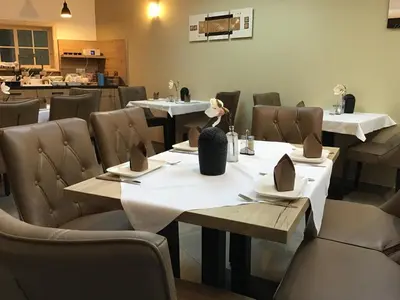 Ein Sitzbereich in der Unterkunft Ehringer Hof