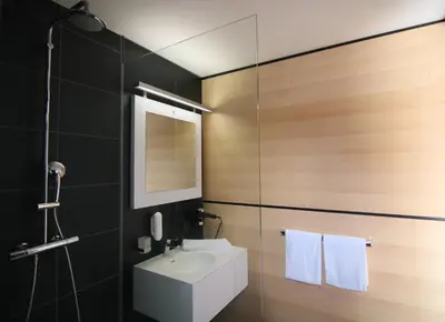 Ein Badezimmer in der Unterkunft KF Hotel by WMM Hotels