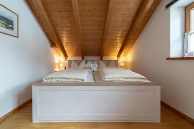 Ein Bett oder Betten in einem Zimmer der Unterkunft Gasthof zum Stern