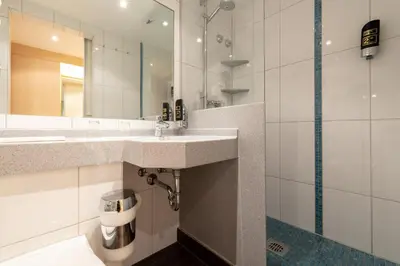 Ein Badezimmer in der Unterkunft Gasthof zum Stern