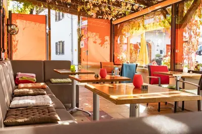 Ein Sitzbereich in der Unterkunft Apparthotel - Pension Ammertaler Hof