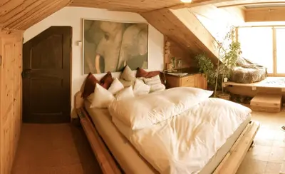 Ein Bett oder Betten in einem Zimmer der Unterkunft Schatzl Hütte