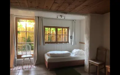 Ein Bett oder Betten in einem Zimmer der Unterkunft Schatzl Hütte