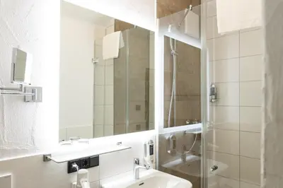 Ein Badezimmer in der Unterkunft Die Bruckmühle