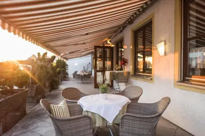 Ein Sitzbereich in der Unterkunft Hotel Ariadne