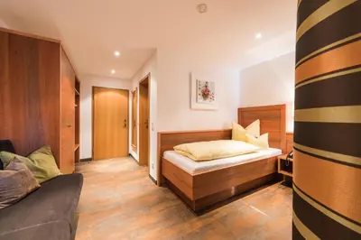 Ein Bett oder Betten in einem Zimmer der Unterkunft Hotel Ariadne