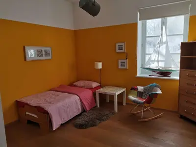 Ein Bett oder Betten in einem Zimmer der Unterkunft Ferienwohnung Dausacker