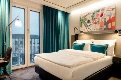 Ein Bett oder Betten in einem Zimmer der Unterkunft Motel One München-Haidhausen