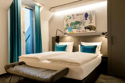 Ein Bett oder Betten in einem Zimmer der Unterkunft Motel One München-Haidhausen