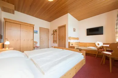 Ein Bett oder Betten in einem Zimmer der Unterkunft Landgasthof Pilsenhof Entenbraterei