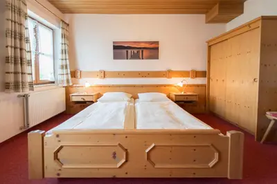 Ein Bett oder Betten in einem Zimmer der Unterkunft Landgasthof Pilsenhof Entenbraterei