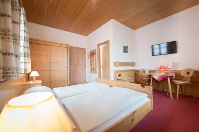 Ein Bett oder Betten in einem Zimmer der Unterkunft Landgasthof Pilsenhof Entenbraterei