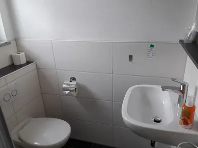 Ein Badezimmer in der Unterkunft Pension Assmann