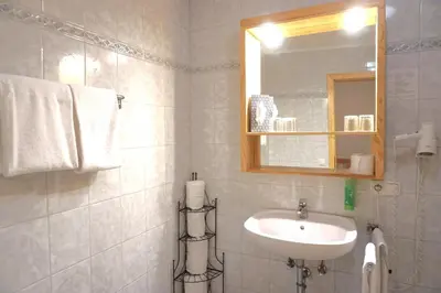 Ein Badezimmer in der Unterkunft Landhotel und Gasthof Kirchberger