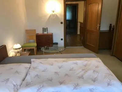 Ein Bett oder Betten in einem Zimmer der Unterkunft Gemütliches Gästehaus!