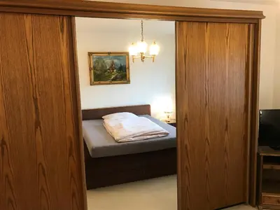Ein Bett oder Betten in einem Zimmer der Unterkunft Gemütliches Gästehaus!
