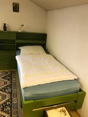 Ein Bett oder Betten in einem Zimmer der Unterkunft Gemütliches Gästehaus!