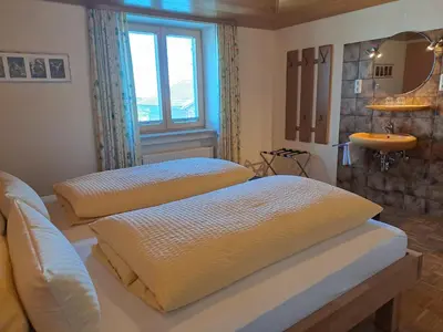 Ein Bett oder Betten in einem Zimmer der Unterkunft Ferienwohnung Hörnle