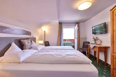 Ein Bett oder Betten in einem Zimmer der Unterkunft Gästehaus Angela