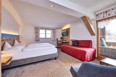 Ein Bett oder Betten in einem Zimmer der Unterkunft Gästehaus Angela
