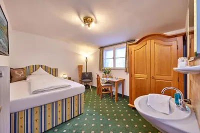 Ein Bett oder Betten in einem Zimmer der Unterkunft Gästehaus Angela